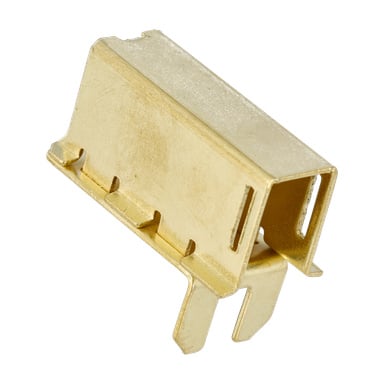 Närbild på Carb Holder Gräklippare 010026: en guldmetallkontakt med en rektangulär urholk och flera platta taggar under.