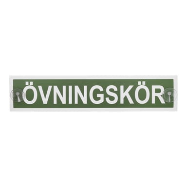 En rektangulär grön Hamron Learner-platta med ordet "ÖVNINGSKÖR" i vit text, med en transparent sugkopp på vardera sidan.
