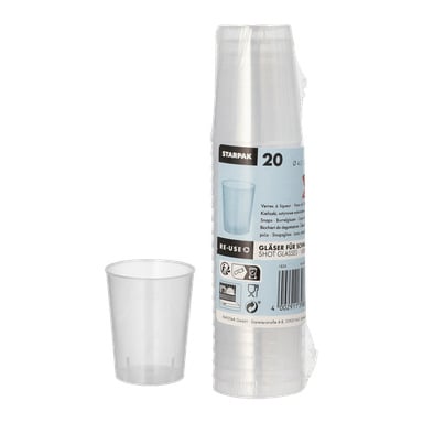En pakke med 20 gjennomsiktige Papstar-shotglass med produktinformasjon og mengde på emballasjen står ved siden av et uinnpakket klart shotglass.