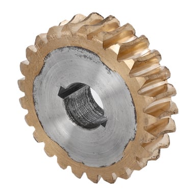 Detaljerad vy av en Rotavator maskväxel med silverkärna, guldkant, centralt hål, vinklade tänder och tecken på ytslitage.