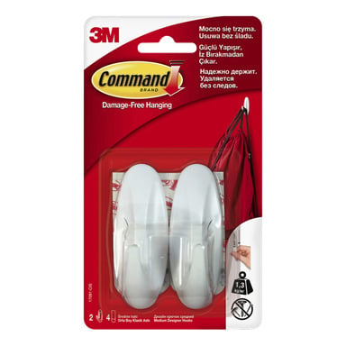 Pakiet haczyków Command Design 2 pokazuje dwa białe haczyki w plastiku, informacje o produkcie, czerwony wiszący obraz torby oraz nośność 1,3 kg.