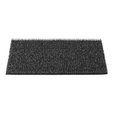 Astro Turf Turf Mat Original er en rektangulær svart matte med teksturert overflate og tett pakkede oppreist bust, sett ovenfra.