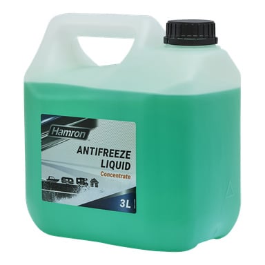 En 3-liters grön Hamron frostskyddsflaska med svart kork, märkt med märke, produktnamn och ikoner för fordon och ett hus.