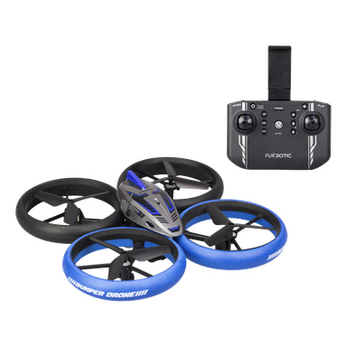 Silverlit Bumper Drone Vision Wifi -nelikopteri sinimustine puskureineen on mustan kaukosäätimen vieressä, jossa lukee "FlynBotic".