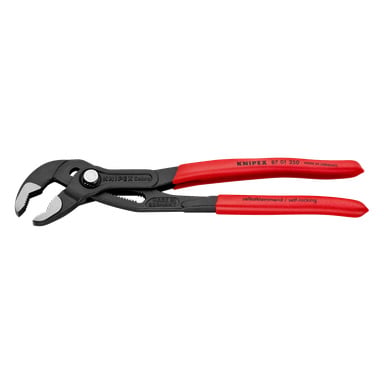 Knipex Cobra-tänger med svarta käftar och röda handtag, märkta "självlåsande" och "Made in Germany", visar synlig justering och sågtand.