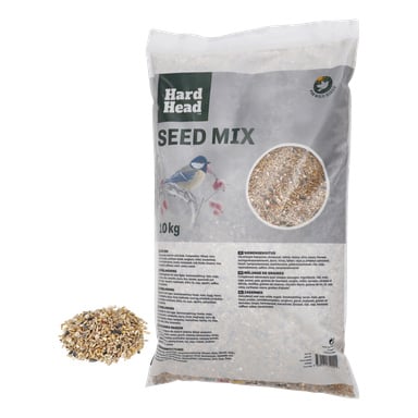 En 10 kg Hard Head Seed blandningspåse med fågelbild och klart fönster; En liten hög med fröblandning ligger bredvid påsen.