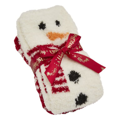 Et par hvite Bluewear-sokker med snømannansikt og knappedesign, brettet og bundet med et rødt bånd med teksten "Merry Christmas" i gulltekst.
