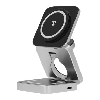 Ett vikbart, silverfärgat och svart trådlöst laddningsställ med en cirkulär laddningsplatta och en USB-C-port, som visas i delvis öppet läge mot en vit bakgrund.
