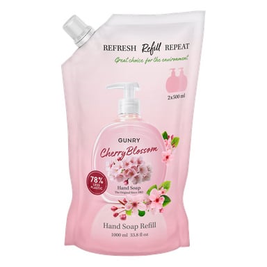 Gunry Cherry Blossom Handtvålpåfyllning i en 1000 ml rosa påse, med körsbärsblommor och "Refresh, Refill, Repeat." Använder 78 % mindre plast.