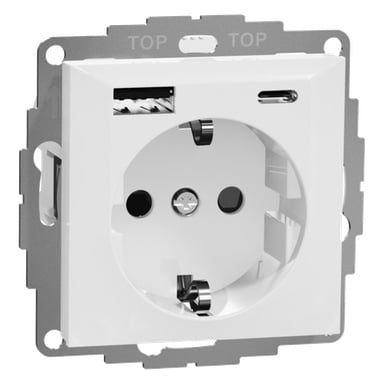 Ett vitt vägguttag har ett cirkulärt uttag, en USB-A-port och en USB-C-port på en metallram märkt TOP i kanten.