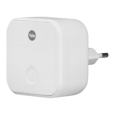 En kompakt, fyrkantig vit apparat med en ansluten kabel.