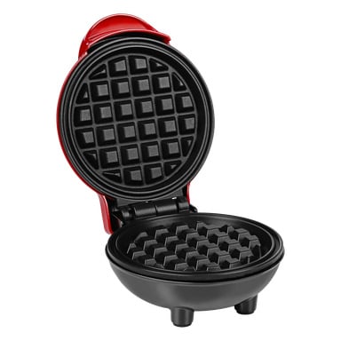 Ett öppet, runt svart och rött våffeljärn visar sina nonstick-tallrikar. Den står på fyra korta ben och är tom inuti.