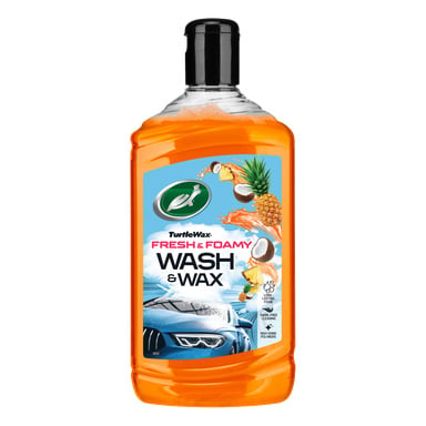 Turtle Wax Fresh & Foamy Wash & Wax-flaska med ananas- och kokosgrafik. Har en blå bil, skumspray och textmarkeringar.