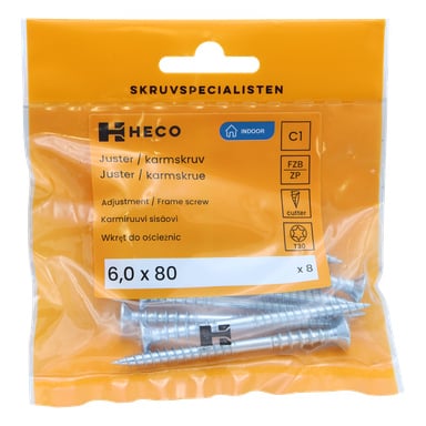 Heco:n muovikotelo, jossa lukee "Säätöruuvi 8 paketti", sisältää kahdeksan hopeista säätöruuvia, kukin kooltaan 6,0 x 80 mm. Oranssi etiketti kertoo tekniset tiedot, ja ruuvit näkyvät pakkauksen kirkkaan alaosan läpi.