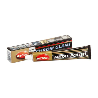Autosol Metal Polish -putki seisoo vastaavan vähittäiskaupan laatikon edessä, molemmissa ruskea ja kultainen kuvio, rohkeat Autosol-logot ja kuvat, jotka korostavat kiiltäviä metallipinnoja.