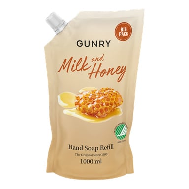 En beige 1000 ml-påse med Gunry Hand Soap Refill med bilder på honungskaka och honung, märkt "BIG PACK" och med en ekomärkning med mjölk och honung.