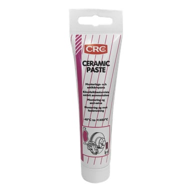 Et hvitt rør med CRC Ceramic Assembly Paste med rosa og svart skrift og et bilde av en bremseskive. Etiketten indikerer at den er beregnet for montering og anti-seiz, egnet for temperaturer fra -40°C opp til 1400°C.
