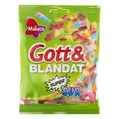 En grønn pose med Malaco Gott & Blandat Supersur-godteri avslører et utvalg fargerike sure gummies inni. Emballasjen viser Malaco-merket med dristige, lekne skrifttyper og livlige grafikker.