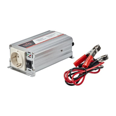 En silverfärgad LTC Voltage Converter 12-300 med ett AC-uttag, flera strömbrytare, indikatorlampor och anslutna röda och svarta alligatorklämmor.