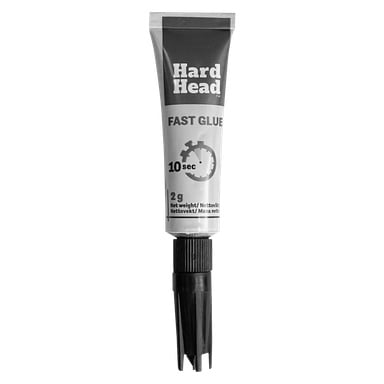 Et 2-grams Hard Head Fast lim-rør med svart dyse, vist i gråtoner. Et stoppeklokkeikon viser en 10-sekunders timer.