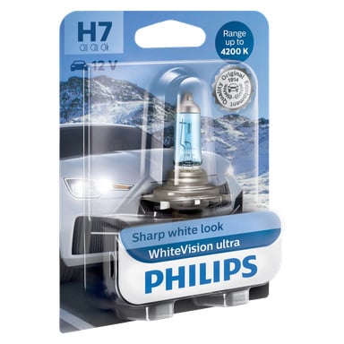 Esillä on Philips Car -ajovalolamppu WhiteVision Ultra -paketti, jossa on sinertävä lamppu ja kuva autosta lumisessa ympäristössä. Pakkaus korostaa kirkasta valkoista valoa ja jopa 4200K värilämpötilaa.