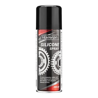 Puszka silikonowego Hamron o pojemności 200 ml z czarną nakrętką, z ilustracjami metalowych zębatków na etykiecie. Etykieta opisuje jego zastosowania dla tworzyw sztucznych, gumowych i metalowych, podkreślając właściwości takie jak wodoodporność, ochrona i redukcja tarcia.