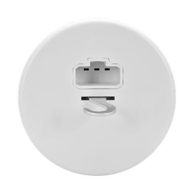 Et nærbilde av Anslut Lampe-socket DCL, som viser dens hvite, sirkulære form med en rektangulær port øverst og et metallisk kroklignende element like under.