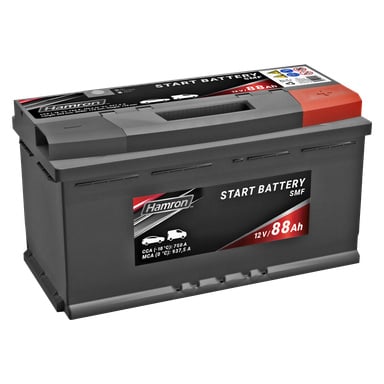 Ett rektangulärt Hamron-bilbatteri med en kapacitet på 88 Ah, designat med ett grått och rött hölje, ett stadigt bärhandtag och etiketter på toppen och sidan som visar spänning, säkerhetssymboler och tekniska specifikationer.