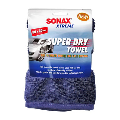 Blå Sonax Microfibre stoff Xtreme SuperDry Towel i emballasje med en sportsbil, teksten SUPER DRY TOWEL, THE ULTIMATE TOWEL FOR FAST CLEANING, 80 x 40 cm, og instruksjoner for å bevege det over en våt bil for effektiv tørking.