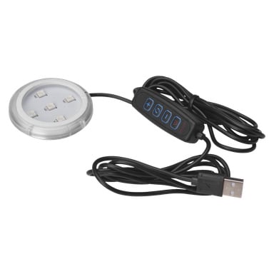 En sirkulær LED-plate designet for Poppy MULTI av Hamron, utstyrt med USB-kabel og en innebygd fjernkontroll med fire knapper for å styre strøm og justere lysstyrke.