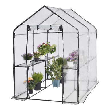 Hard Head Greenhouse er en kompakt, klar enhet med svart ramme, som holder ulike potteplanter og blomster på hyller og gulv.
