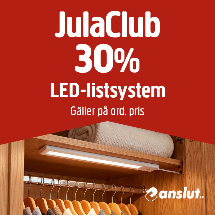 En röd annons med fet vit text marknadsför ett erbjudande från JulaClub: 30 % rabatt på LED-belysningssystem till ordinarie pris. Under texten syns en LED-ljuslist monterad inuti en trägarderob ovanför hyllor och hängande kläder. Varumärket Ansluts logotyp syns i det nedre högra hörnet.