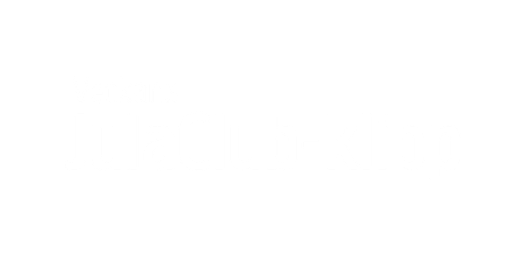 Grå bakgrund med vit text som lyder Veckans JulaClub-klipp. Designen är enkel och innehåller inga andra bilder eller objekt.